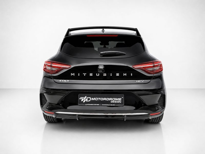 A-520_3jpg - OPSHOLDERS Rear view of a glossy black Mitsubishi Colt HEV SUV with a Motordrome Design plate, in a studio setting