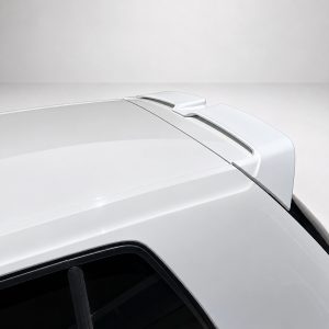 A-521_3jpg - OPSHOLDERS White car rear with a high-mounted spoiler and roofline—a sleek aerodynamic cargo-enhancing accessory on a SUV/CUV tailgate area