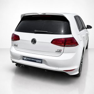 A-521_5jpg - OPSHOLDERS White Volkswagen SUV rear view in a studio setting with a visible rear hatch, taillights, and a Motorsport-style plate reading 'Motorodome Design' at the bumper edge