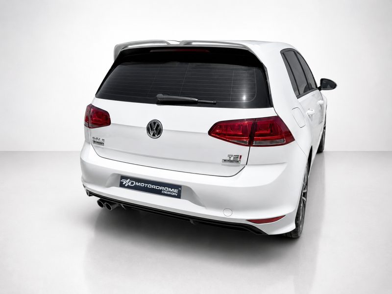 A-521_5jpg - OPSHOLDERS White Volkswagen SUV rear view in a studio setting with a visible rear hatch, taillights, and a Motorsport-style plate reading 'Motorodome Design' at the bumper edge
