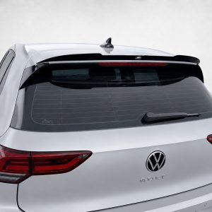 A-522_4jpg - OPSHOLDERS Rear view of a silver VW Golf hatchback with a roof spoiler, shark fin antenna, and prominent VW logo on the trunk.