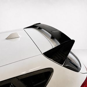 A-535_4jpg - OPSHOLDERS White car rear roof with a black spoiler above the rear window.