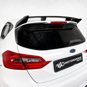 A-535_5jpg - OPSHOLDERS White Ford hatchback rear view with a carbon-style spoiler and red taillights