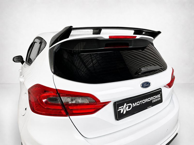 A-535_5jpg - OPSHOLDERS White Ford hatchback rear view with a carbon-style spoiler and red taillights