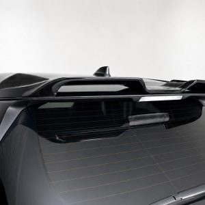A-536_6jpg - OPSHOLDERS Rear upper view of a dark SUV showing a sleek roof spoiler and third brake light above the rear window.
