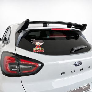 White Ford SUV rear with a 'Baby on Board' sticker on the rear window and a spoiler visible under a clean car design
