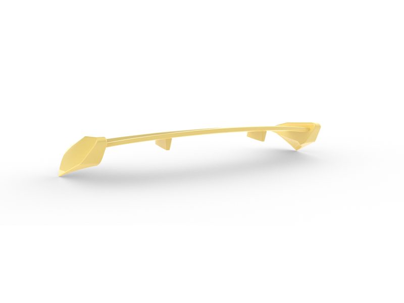 A-538_5jpg - OPSHOLDERS Gold-colored curved bar with pointed arrowhead ends resting on a white surface