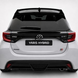 A-541_3jpg - OPSHOLDERS Rear view of a Toyota Yaris Hybrid with 'YARIS HYBRID' plate and GR SPORT badge on the right tailgate.