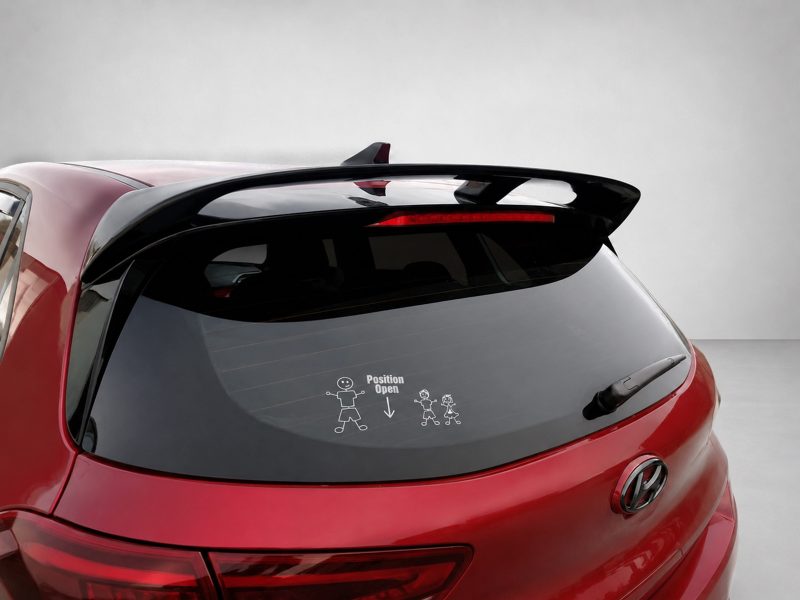 Rear view of a red hatchback showing a spoiler and a windshield decal that reads 'Position Open' with simple stick-figure illustrations indicating opening position.