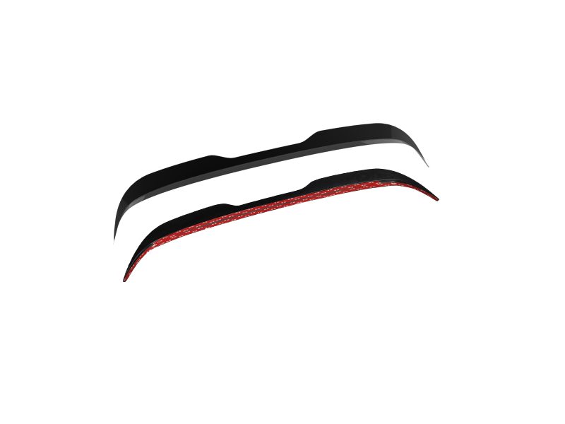 Two sleek black curved shapes with a red patterned underside, arranged diagonally on a white background (abstract, wing-like forms).