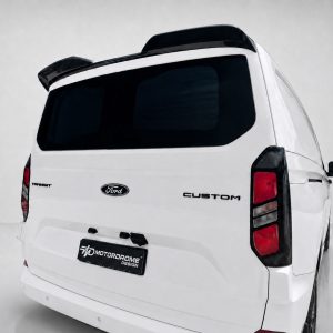 A-550_4jpg - OPSHOLDERS White Ford Transit Custom van seen from rear-right, displaying black-tinted rear window and custom Motordome Design license plate.