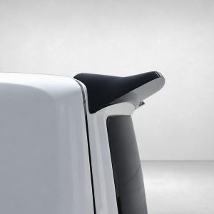 A-550_6jpg - OPSHOLDERS Close-up of a white vehicle's rear with a black spoiler mounted on the tailgate edge.