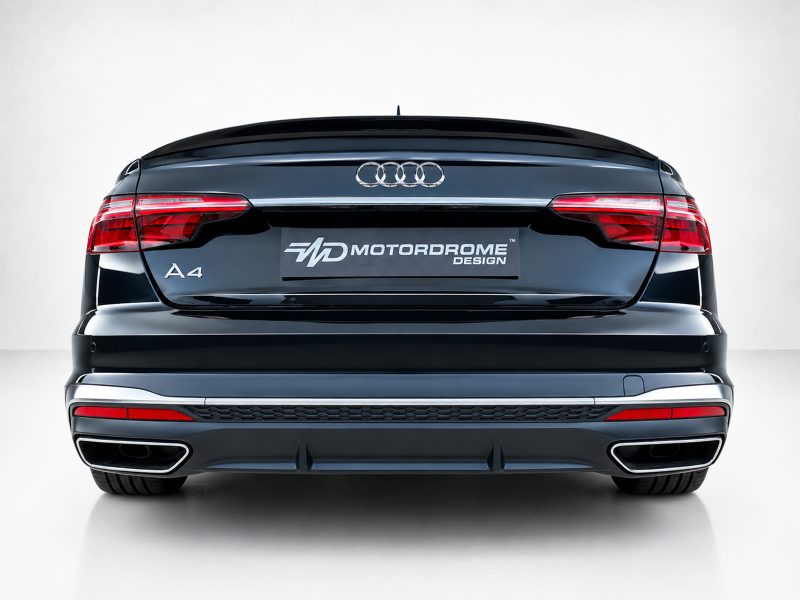 A-556_6jpg - OPSHOLDERS Rear view of a black Audi A4 with a Motordrome Design plate on the trunk lid.