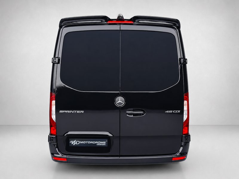 Rear view of a black Mercedes Sprinter van with split rear doors and red taillights