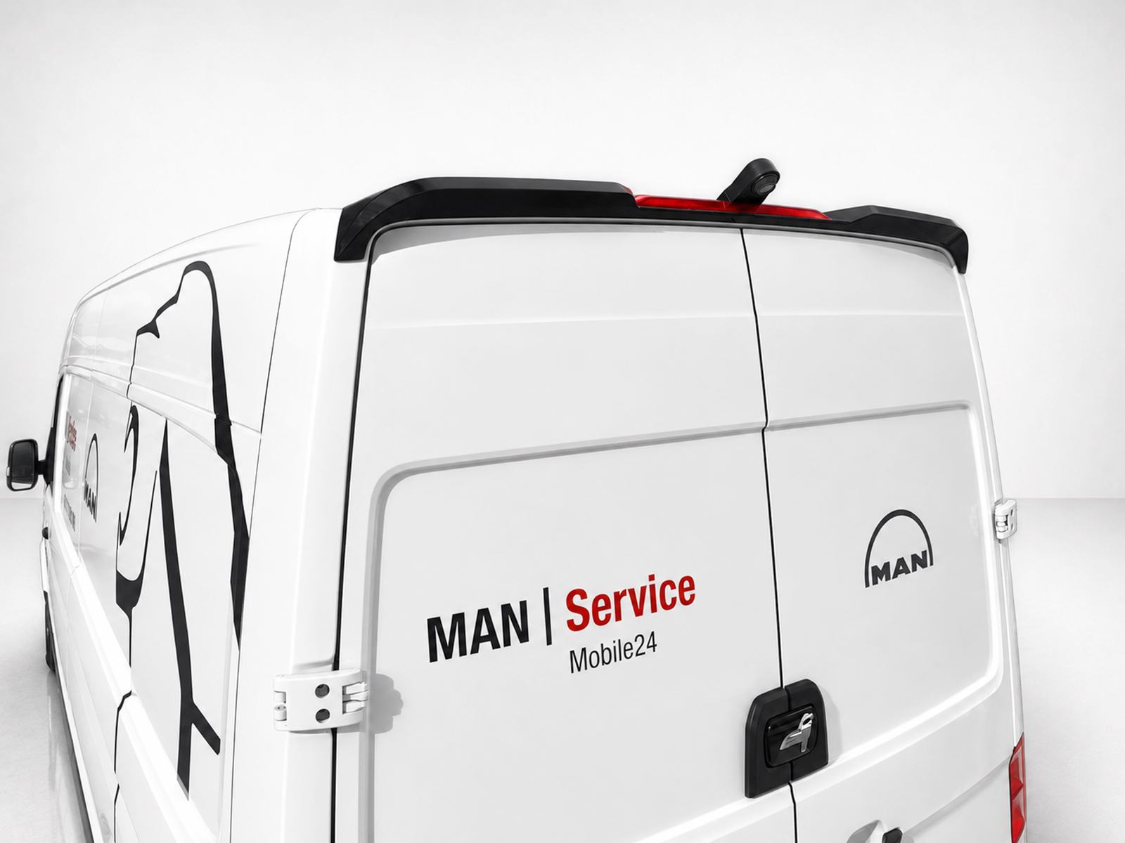 A-561_1jpg - OPSHOLDERS Rear view of a white MAN service van with branding and closed rear doors; side reads 'MAN | Service Mobile24' with MAN logo nearby.