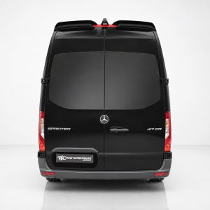 Rear view of a black Mercedes‑Benz Sprinter van with split rear doors and red taillights on a light backdrop.