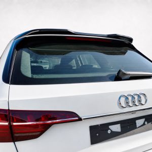 Rear view of a white Audi SUV showing the trunk, rear windshield, wiper, and red taillights with the Audi emblem visible