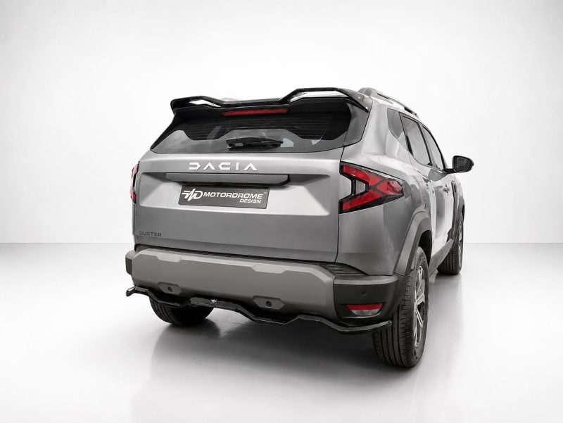 Rear three-quarter view of a silver SUV with roof rails and dark tail lights in a white studio setting, showing a Motordrome Design plate on the tailgate