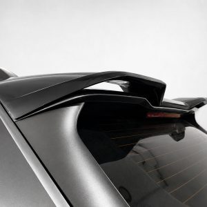 Close-up of a car's rear end featuring a large spoiler on the hatch.