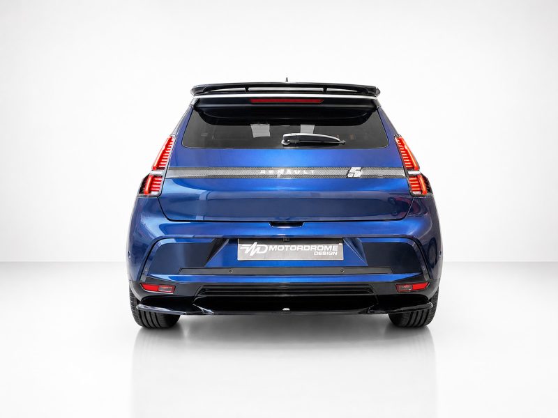 Blue SUV rear view in a studio, with vertical LED taillights, rear spoiler, and a MOTORDROME DESIGN plate across the tailgate.