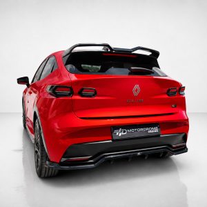 Rear view of a red Renault Clio hatchback with black spoiler, shown in a white studio setting.