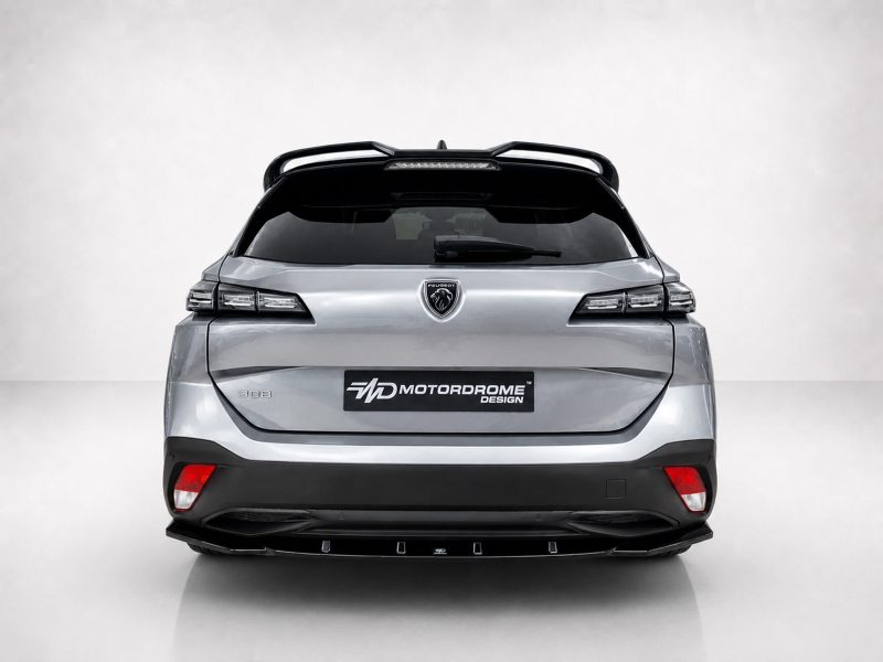 A-574_3jpg - OPSHOLDERS Rear view of a silver Peugeot SUV featuring the Peugeot badge and a Motordrome Design plate on the tailgate.
