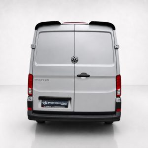 A-576_3jpg - OPSHOLDERS Rear view of a silver Volkswagen Crafter cargo van with split back doors and VW emblem in the center
