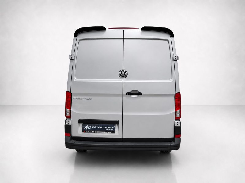 A-576_3jpg - OPSHOLDERS Rear view of a silver Volkswagen Crafter cargo van with split back doors and VW emblem in the center