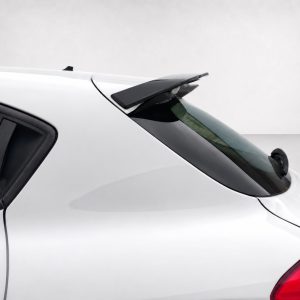 White car rear end with a black spoiler mounted on the tailgate above the rear window.