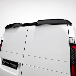 Rear of a white cargo van with a black roof spoiler and partial taillights visible on the right side.