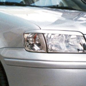 Partial front-left view of a silver car, showing the headlight and fender.
