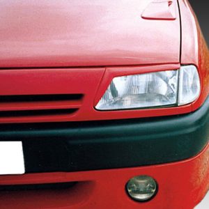Front view of a red car showing the left headlight, grille with the Citroën emblem, and bumper against a gradient gray background.