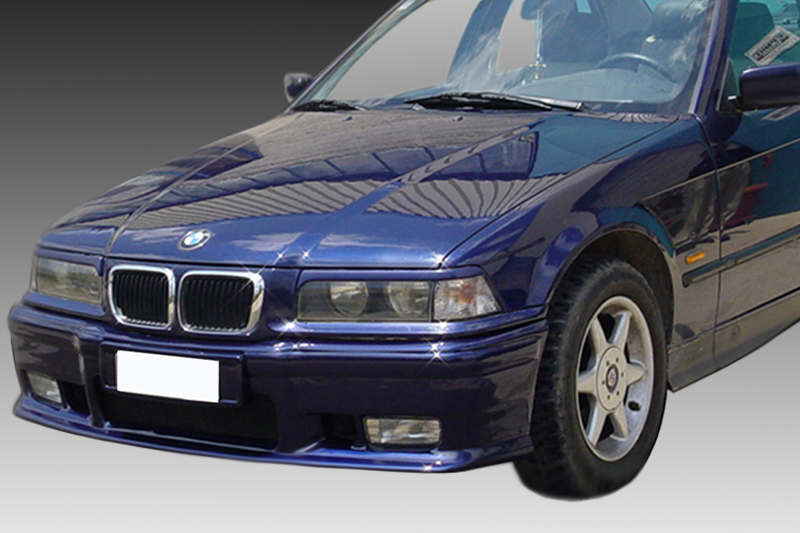 FR000023_1jpg - OPSHOLDERS Blue BMW sedan, front-left view, showing grille, headlights, and badge on the hood