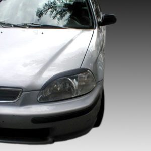 Front-left view of a silver sedan showing headlight, grille with Honda emblem, and bumper against a gray gradient background.