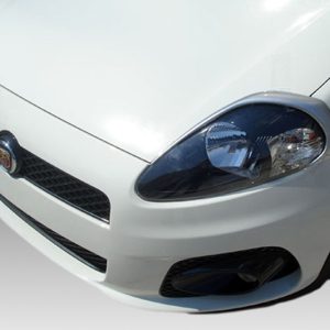 Front-left view of a white car showing the headlight, grille, and bumper against a gray gradient background.