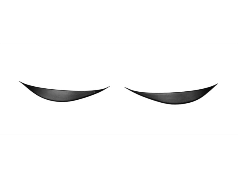Pair of stylized closed eyes, the left and right crescents facing upward on a white background, suggesting sleep or calm.