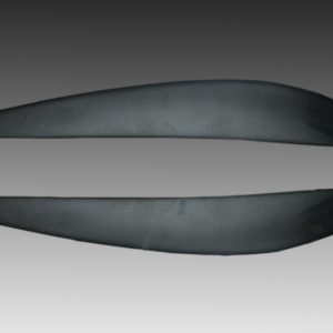 Two dark gray curved blade-like shapes laid flat against a gradient gray background at the top and bottom of the image.