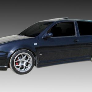 Dark blue hatchback with silver aftermarket wheels, shown in profile against a gray gradient background.