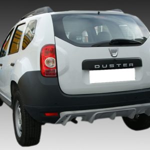 Rear view of a white Dacia Duster SUV showing its tailgate and bumper, with the DUSTER badge visible