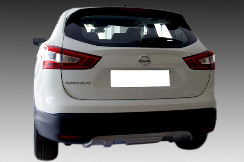 K140-002_1jpg - OPSHOLDERS Rear view of a white Nissan SUV (Qashqai) showing taillights and license plate area.