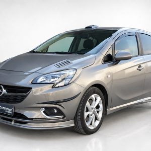 K145-004_2jpg - OPSHOLDERS Gray Opel hatchback photographed from the front-right, showing headlights and alloy wheels in a studio setting.