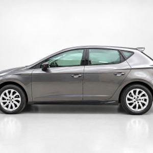 Side profile of a gray compact hatchback car in a studio setting with white background.