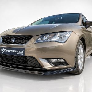 Front-left view of a metallic beige SEAT car in a studio, with a Mesh grille and logo visible on the bumper plaque reading 'Motordrome Design'