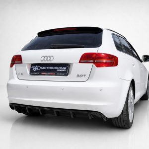 Rear three-quarter view of a white Audi A3 hatchback showing taillights and badge on a light backdrop as a product shot in a studio.