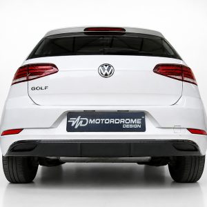 K156-002_2jpg - OPSHOLDERS Rear view of a white Volkswagen Golf with red taillights and a Motordrome Design license plate.
