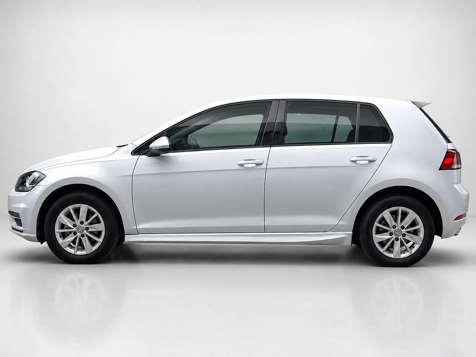 K156-003_1jpg - OPSHOLDERS Side profile of a silver Volkswagen hatchback car on a light gray background.