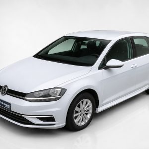 K156-003_4jpg - OPSHOLDERS White Volkswagen sedan shown from a front-left angle in a bright studio setting