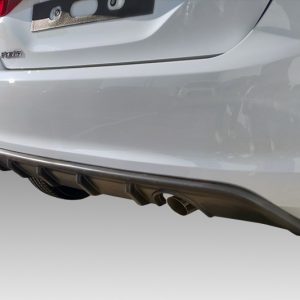 Rear view of a white car showing the bumper, exhaust pipes, and a red taillight on the right side.