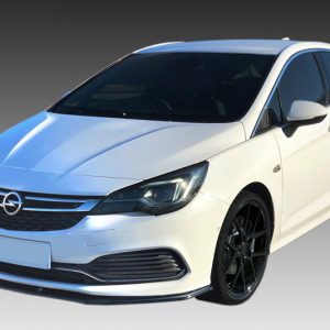White Opel hatchback car angled from front-left with black alloy wheels against a gray backdrop.