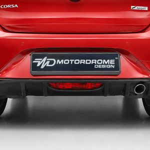Rear view of a red car with a black Motordrome Design license plate and a visible exhaust on the right side.